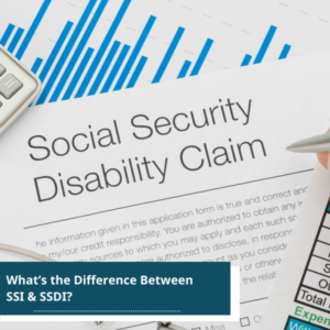 social security disability claim form and a calculator on top of a table